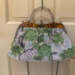 Fun beaded and embroidered fabric bag with optional crossbody chain.